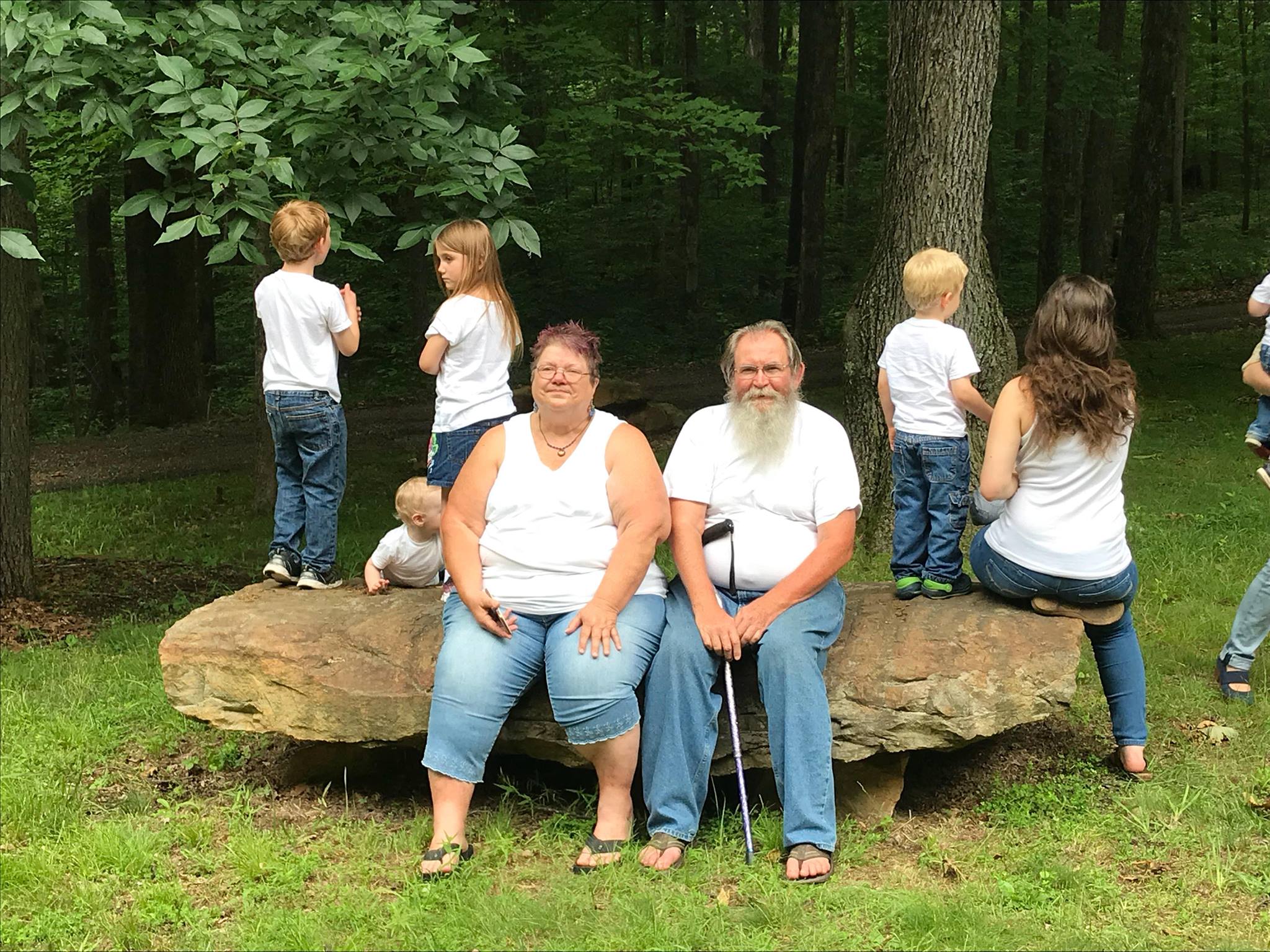 Carol & Larry Burkes with grandchildren